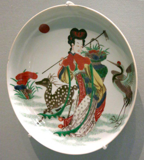 Ma-ku is a Taoist deity of longevity. In the image below, she can be identified by her hoe and a basket of the fungus of immortality. This Ching dynasty porcelain presentation dish was made sometime in the eighteenth century, and is now in the Asian Art Museum in San Francisco (accession no. B60P376):