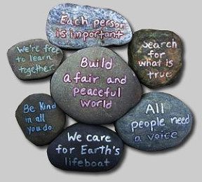Children's version of UUA 7 Principles written on stones.