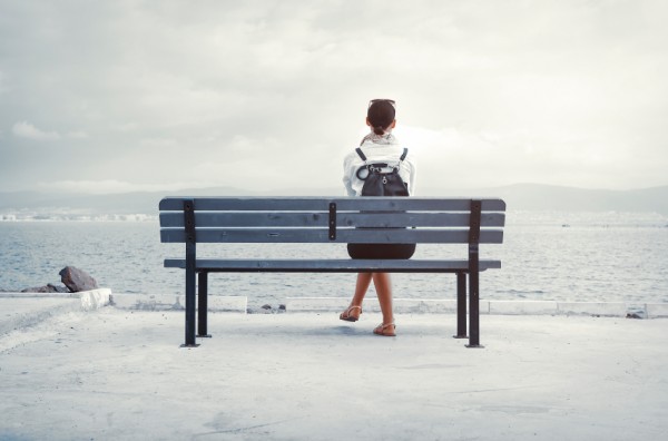 Woman sitting on bench