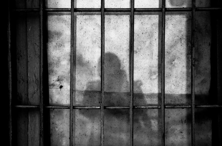 shadow in prison Photo by Ye Jinghan on Unsplash