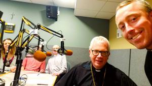 Bishop Hying, Deacon Jim Hoegemeier, a young woman who works in disability ministry their with her fiancee and myself in the studio recording this segment