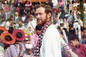 Fr. Rother pictured with a festive crowd of Guatemalan people.