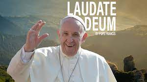 Pope Francis with the legend "Laudate Deum," his apostolic exhortation on climate change.