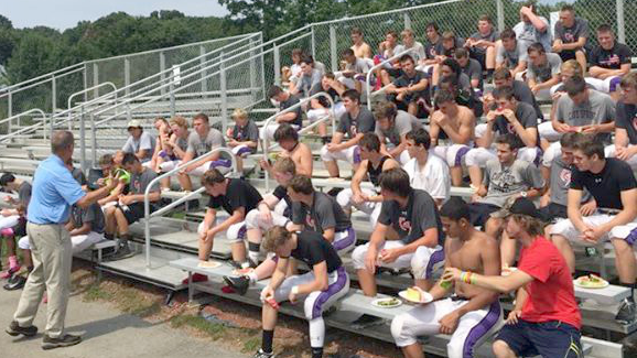 FCA caption: "Fellowship of Christian Athletes FCA serving watermelon and sharing words of faith to the football team... at Cave Spring High School."