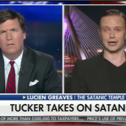 Tucker Carlson to Triumphant Satanist: Go “Crawl Back Into Your Hole”
