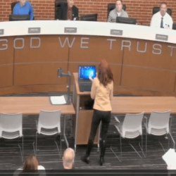 Atheist Kicked Out of MO Town Meeting After Criticizing “In God We Trust” Sign