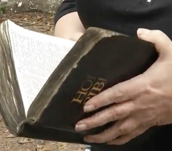 Her Dogs Died in a House Fire, But At Least Her Leather-Bound Bible Is Okay!