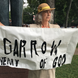 At “Monkey Trial” Museum Opening, Christian’s Sign Reads “Darrow: Enemy of God”