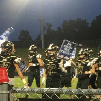 AL High School Football Team Holds “In God We Trust” Signs… Before Losing Game