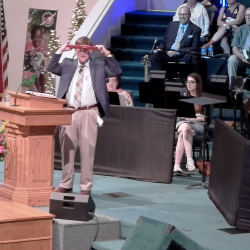 Pastor Cuts Up Nike Headband in Sermon, Gets Standing Ovation from White Church