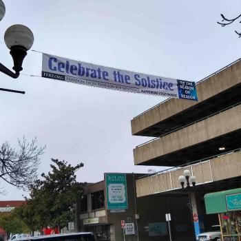 “Celebrate the Solstice” Banner Goes Up Over Street in Eugene, Oregon