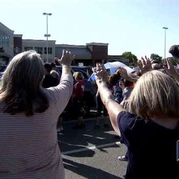 Vigil Held for Christian Supermarket Cashier Told to Stop Praying With Customers