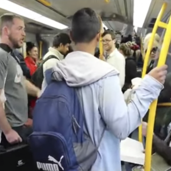 Strangers on a Train: Watch This Preacher Annoy and Infuriate a Captive Audience