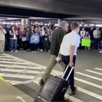 Mormons Irresponsibly Gathered in Utah Airport to Greet Returning Missionaries