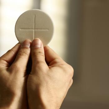 Cardinal Slams Pandemic-Safe Communion Baggies: “You Can’t Put [Jesus] in a Bag”