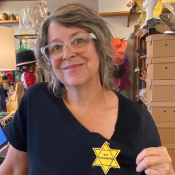 Hat Shop Owner Backtracks After Promoting Star of David “Not Vaccinated” Patches