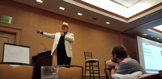 At Business Conference, Speaker Says “If You’re an Atheist, You’re Stupid” as Camera Rolls