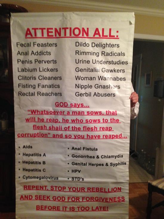 Christian Preacher’s Sign Calls Out “Fecal Feasters,” “Genitalia Gawkers,” and Many More