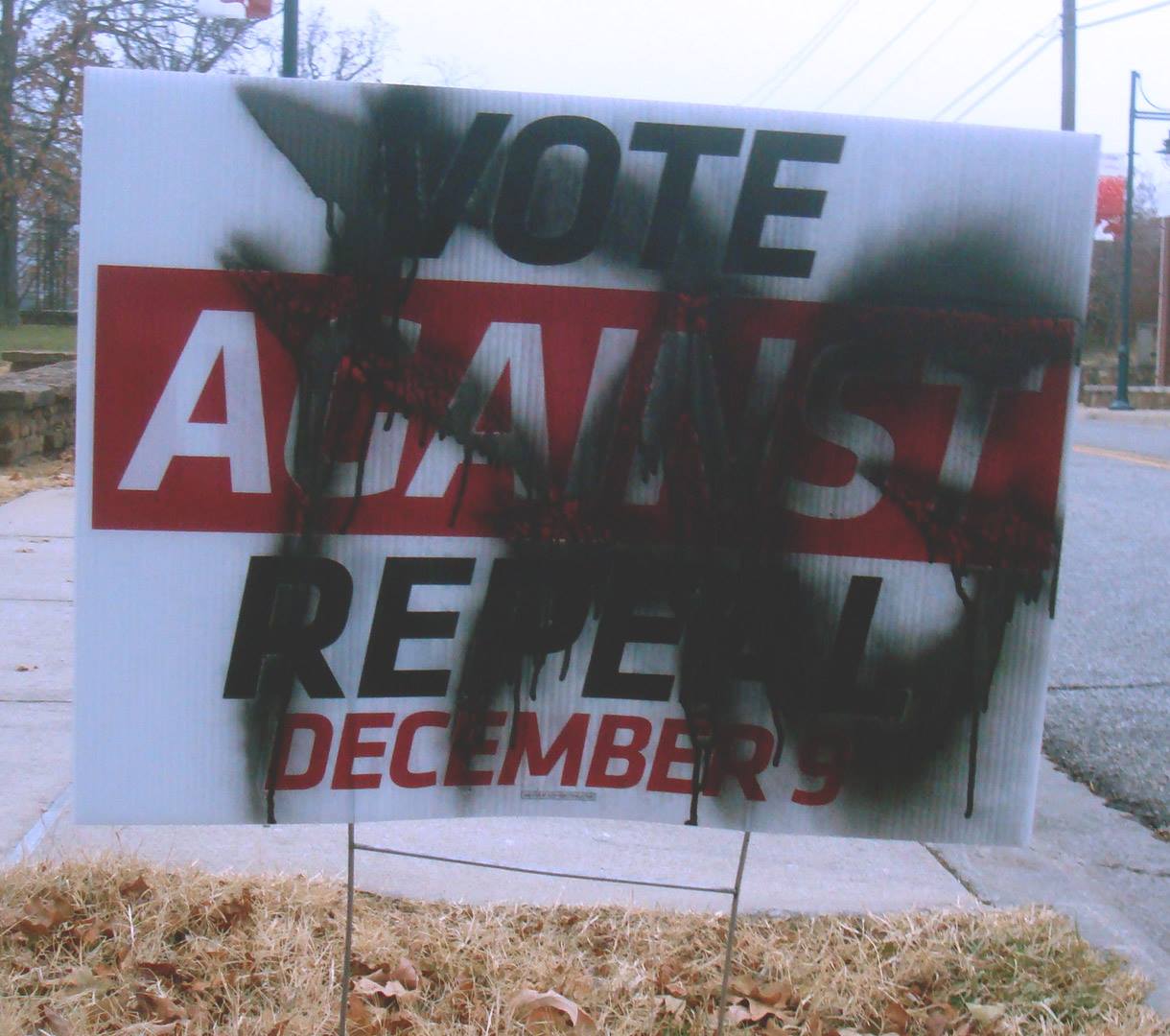 Arkansas Homophobes Paint Slurs On Signs Promoting Tolerance